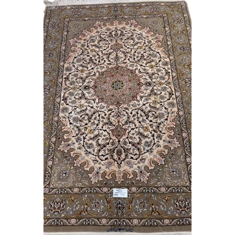 "Luxury Persian rug with wool and silk blend, showcasing intricate arabesque patterns."