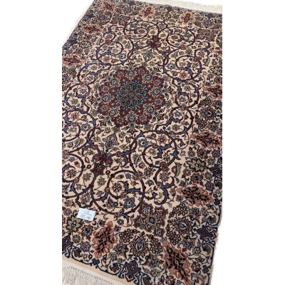 "Timeless Isfahan rug, 70 years old, featuring traditional Persian craftsmanship."