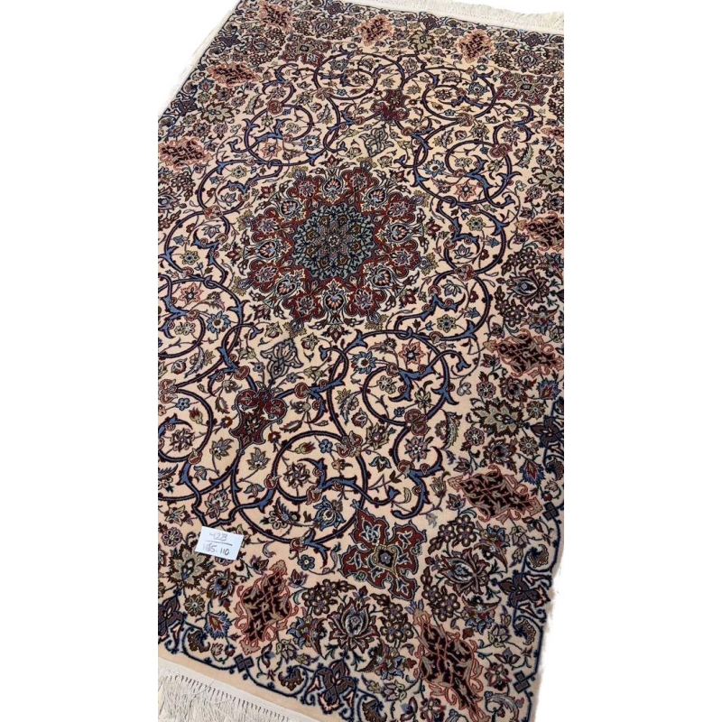 "Timeless Isfahan rug, 70 years old, featuring traditional Persian craftsmanship."