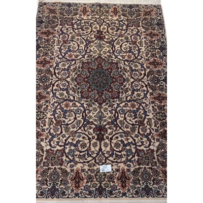 "Semi-antique Isfahan Persian rug with beige, red, and blue floral motifs."
