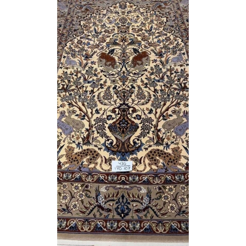 "Luxurious small Persian rug with pile knots and detailed floral motifs"