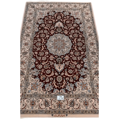 "Hand-knotted luxury Isfahan Persian rug crafted by renowned Taghiezadeh. This exquisite silk and wool Persian rug measures 170 cm x 107 cm (5.6 ft x 3.5 ft), featuring a knot density of 810,000 knots per square meter. Elevate your home decor with this authentic Persian carpet, available online, with only one piece in stock."