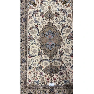 ersian wool and silk rug from Isfahan with beige and blue tones