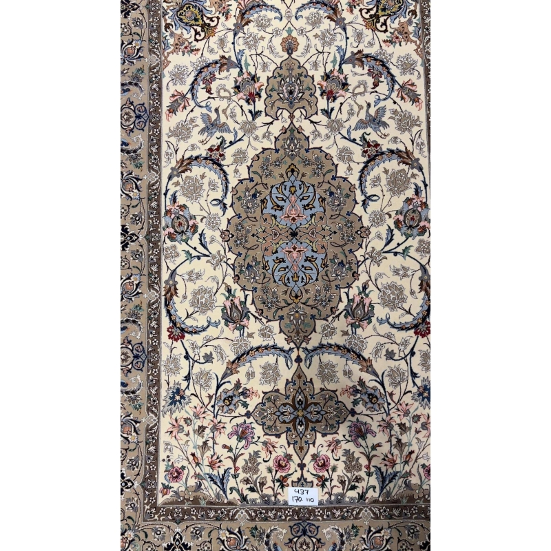 ersian wool and silk rug from Isfahan with beige and blue tones