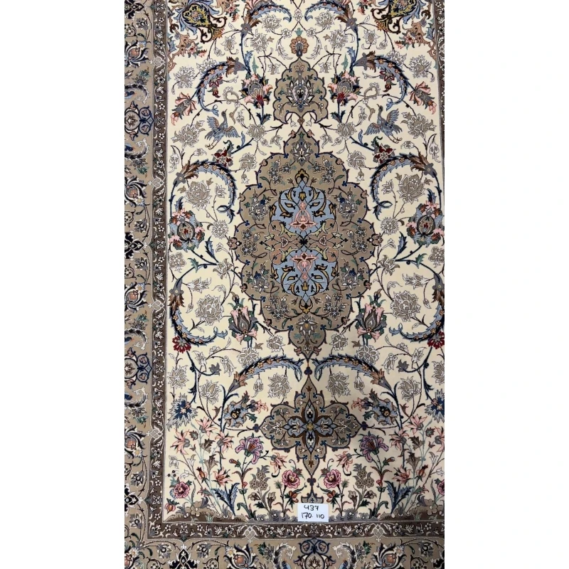 ersian wool and silk rug from Isfahan with beige and blue tones