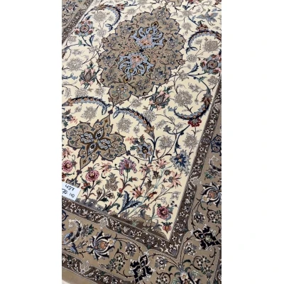 Hand-knotted Persian rug with intricate floral patterns