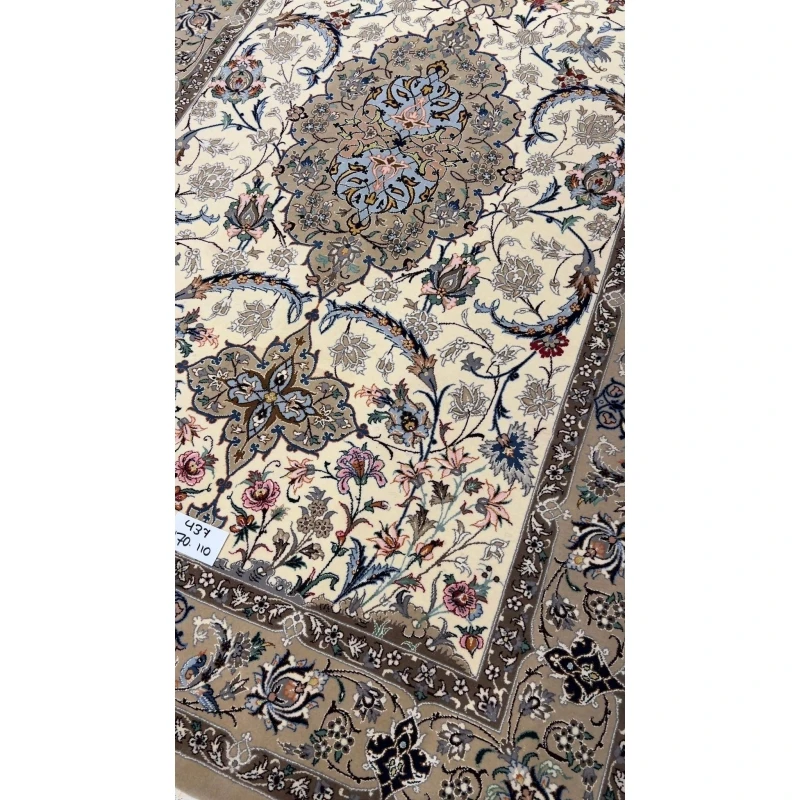 Hand-knotted Persian rug with intricate floral patterns