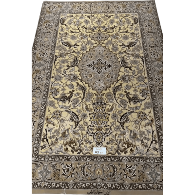 "Hand-knotted Persian rug made from wool and silk, showcasing traditional Isfahan design. Size: 143 cm x 110 cm. Knot density of 810,000 knots/m². Perfect for adding elegance to any living space."