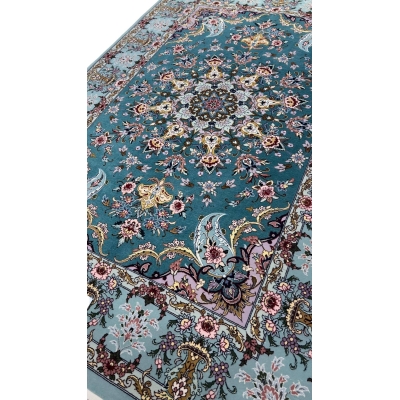 Handmade Persian rug from Isfahan with intricate floral patterns.