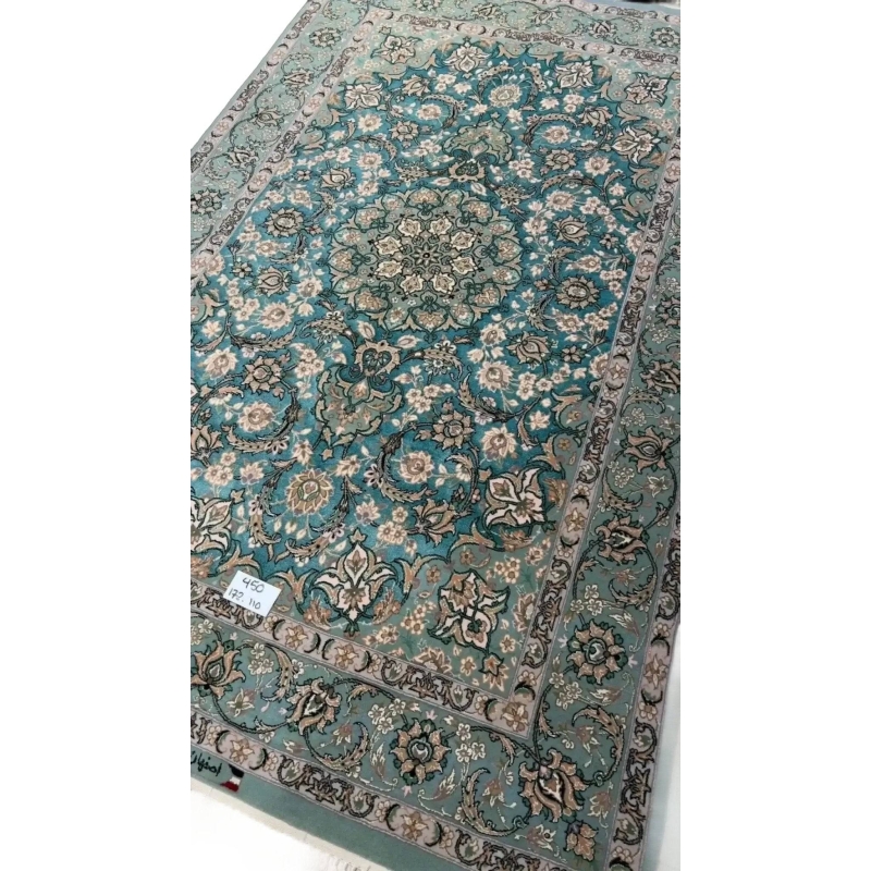 "Exquisite Isfahan handmade rug with silk and wool blend, showcasing a traditional Persian medallion motif."
