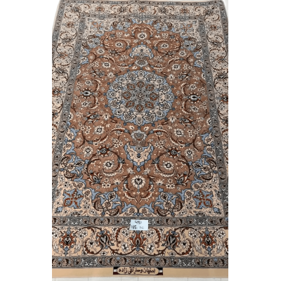 "Elegant Persian Isfahan rug handcrafted from wool and silk, measuring 165 cm x 110 cm. Features detailed traditional patterns, perfect as a luxurious area rug. Made in Isfahan, Iran, by master weaver Taghie Zadeh."