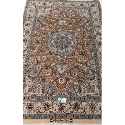 "Elegant Persian Isfahan rug handcrafted from wool and silk, measuring 165 cm x 110 cm. Features detailed traditional patterns, perfect as a luxurious area rug. Made in Isfahan, Iran, by master weaver Taghie Zadeh."