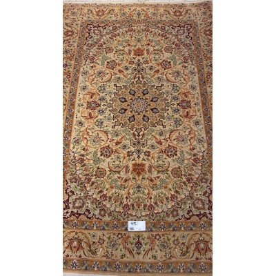 "Handmade vintage Persian rug with intricate floral design from Isfahan, Iran."
