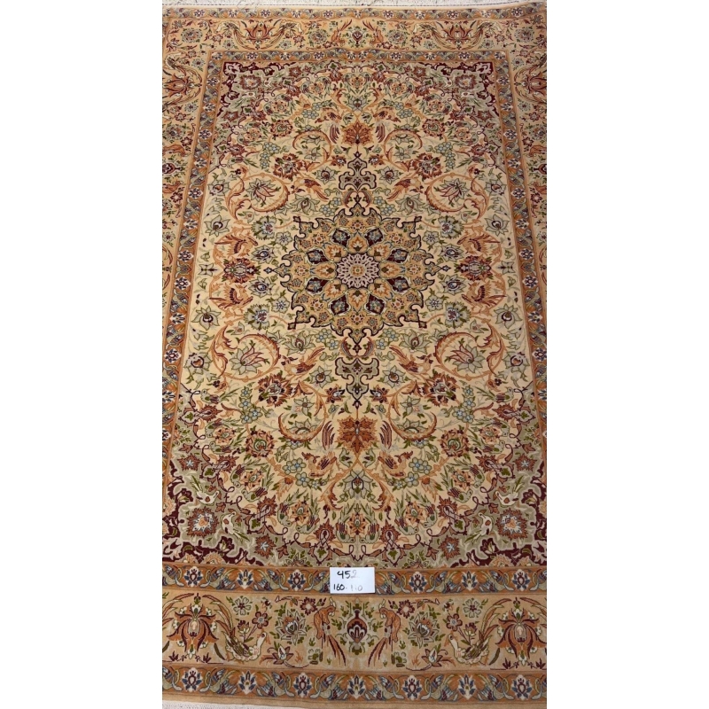 "Handmade vintage Persian rug with intricate floral design from Isfahan, Iran."