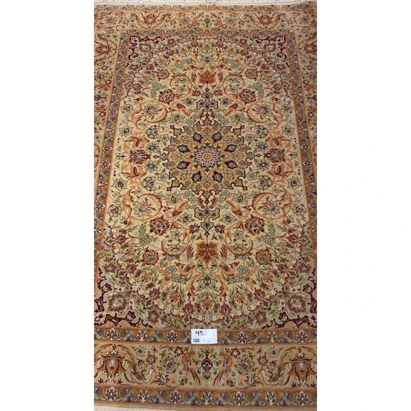 "Handmade vintage Persian rug with intricate floral design from Isfahan, Iran."