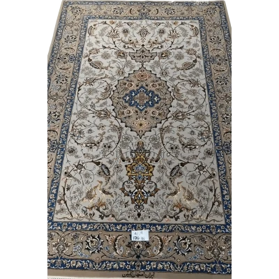 "Light grey Persian Isfahan rug, handcrafted using wool and silk. Elegant designer area rug with intricate details, measuring 170 cm x 110 cm. High knot density for added comfort and beauty."