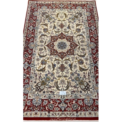 "Hand-knotted Isfahan rug featuring floral designs, crafted with wool and silk."

