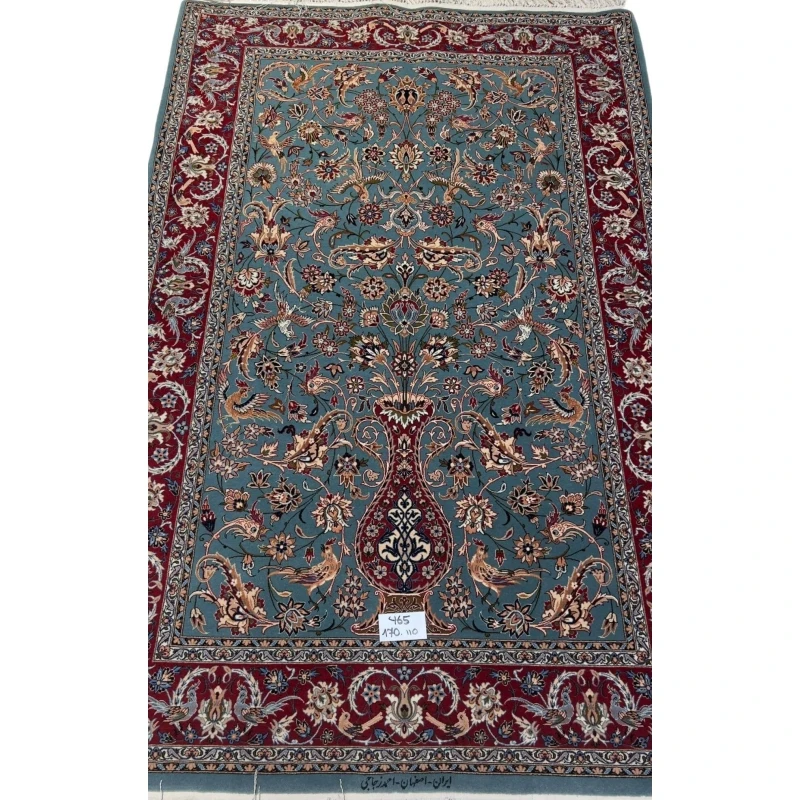 "Hand-knotted light blue Persian rug by Master Zojajie, 170x110 cm, crafted in Isfahan with silk warp and wool-silk blend pile."
