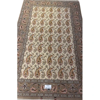 Authentic Persian Isfahan rug with intricate paisley patterns.
