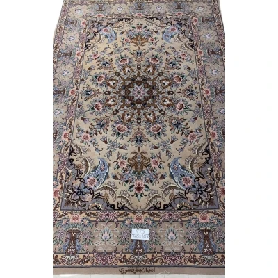 "Hand-knotted traditional Persian rug from Isfahan, made with silk and wool, featuring intricate floral designs in beige and pastel colors, 170x107 cm, crafted by Fakhforie."
