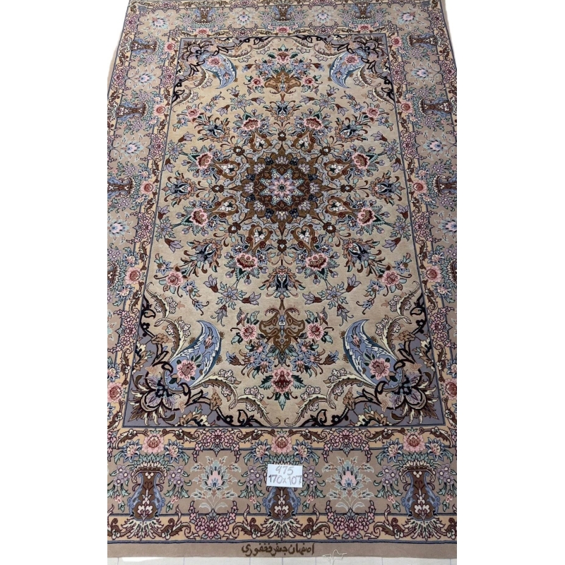 "Hand-knotted traditional Persian rug from Isfahan, made with silk and wool, featuring intricate floral designs in beige and pastel colors, 170x107 cm, crafted by Fakhforie."