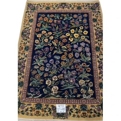 Persian Isfahan floral rug with vibrant pansy and butterfly design.
