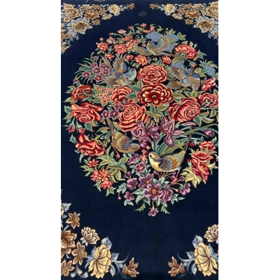 Isfahan navy Persian rug displaying the craftsmanship of floral motifs
