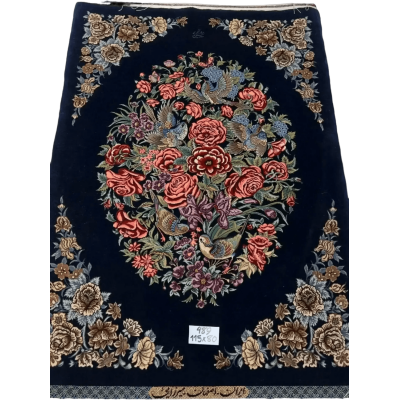 Handcrafted navy Persian rug with intricate floral patterns from Isfahan