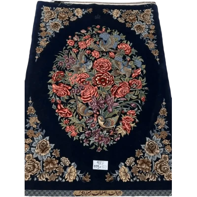 Handcrafted navy Persian rug with intricate floral patterns from Isfahan