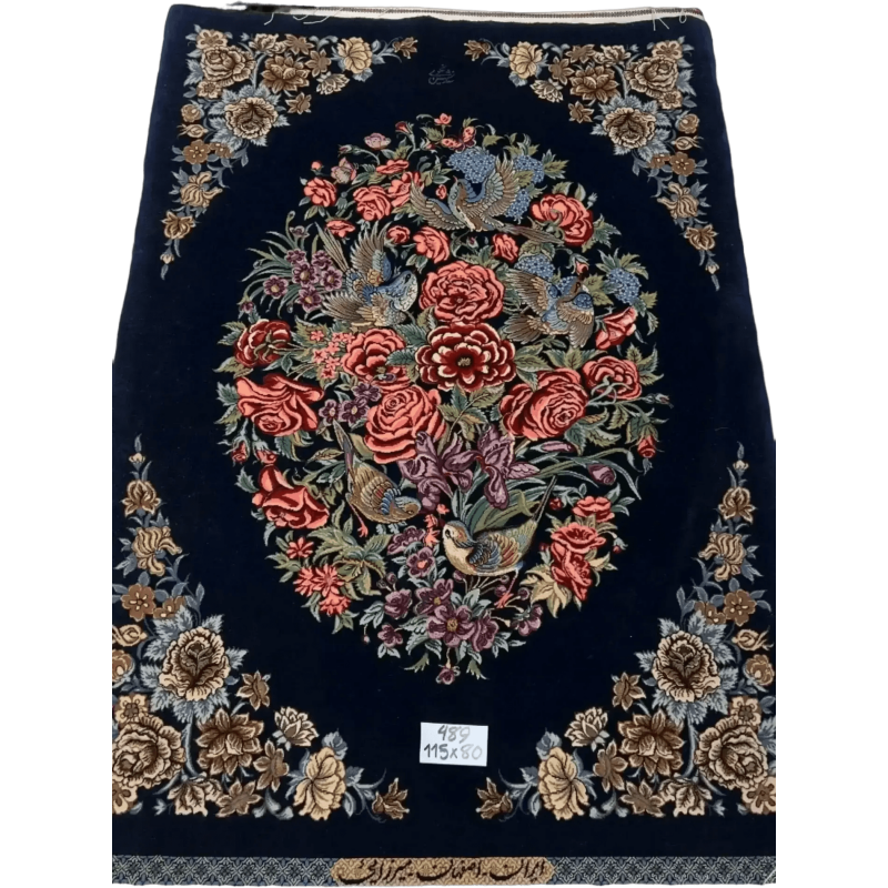Handcrafted navy Persian rug with intricate floral patterns from Isfahan