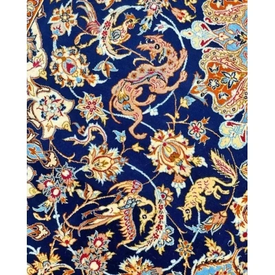 Persian rug with intricate designs, showcasing the craftsmanship of traditional Isfahan weavers.
