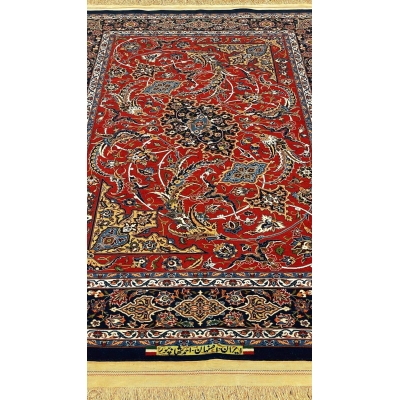 Intricate floral design on luxury red and blue Persian rug