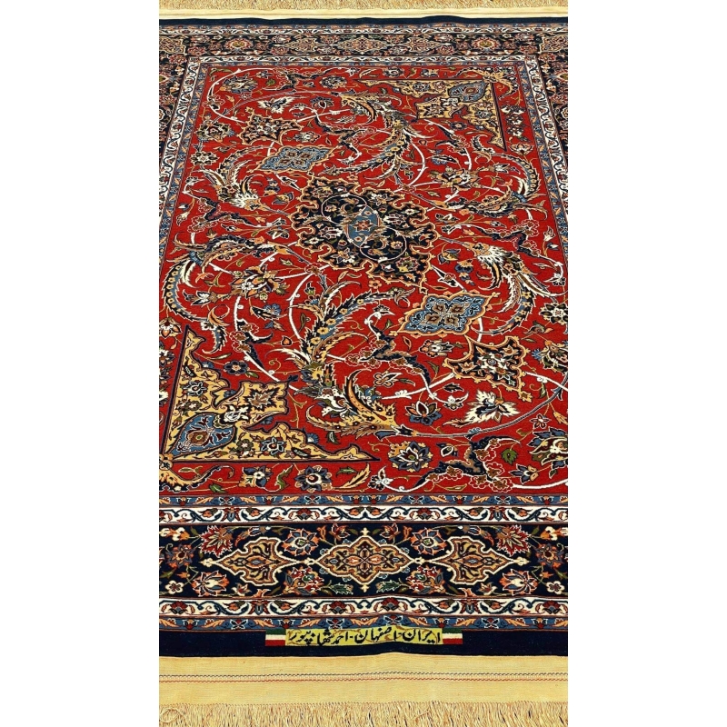 Intricate floral design on luxury red and blue Persian rug