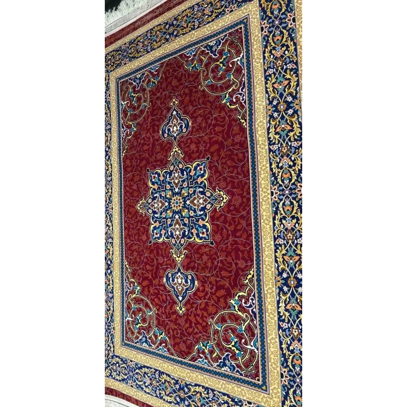 Traditional Persian Kerman Rug - Side view of the hand-knotted Persian rug displaying its vibrant red, gold, and blue color palette, focusing on the elegant floral patterns and central medallion.