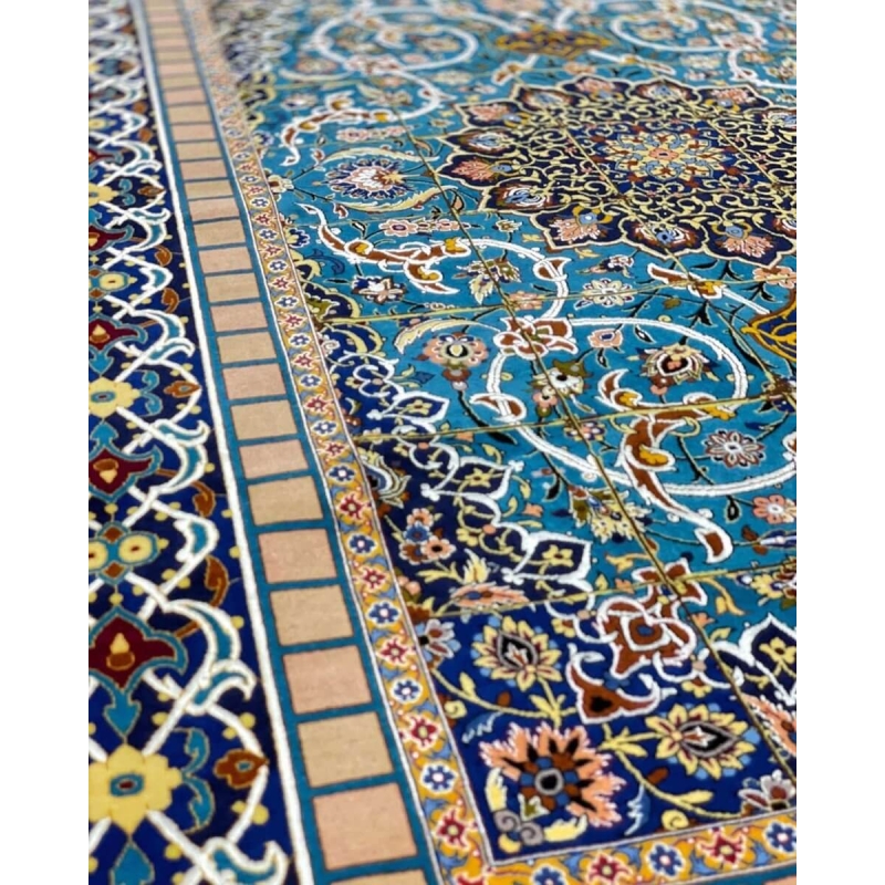 "Detailed corner shot of the Isfahan rug, showing its intricate knotting and floral motifs."
