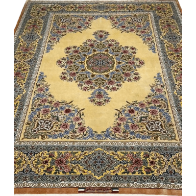 Handcrafted silk rug with intricate floral patterns