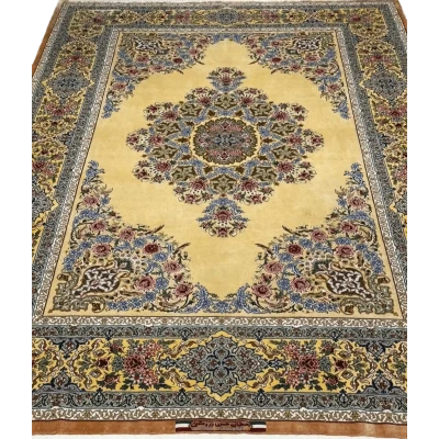 Handcrafted silk rug with intricate floral patterns