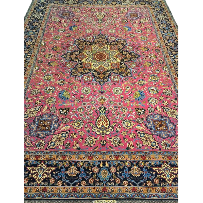 Hand-knotted purple oriental rug with intricate floral patterns, highlighting a vibrant medallion in the center, surrounded by a decorative border.