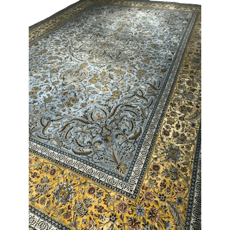 "Intricately woven Persian rug featuring detailed floral patterns and vibrant colors, showcasing exquisite craftsmanship from Isfahan, Iran."