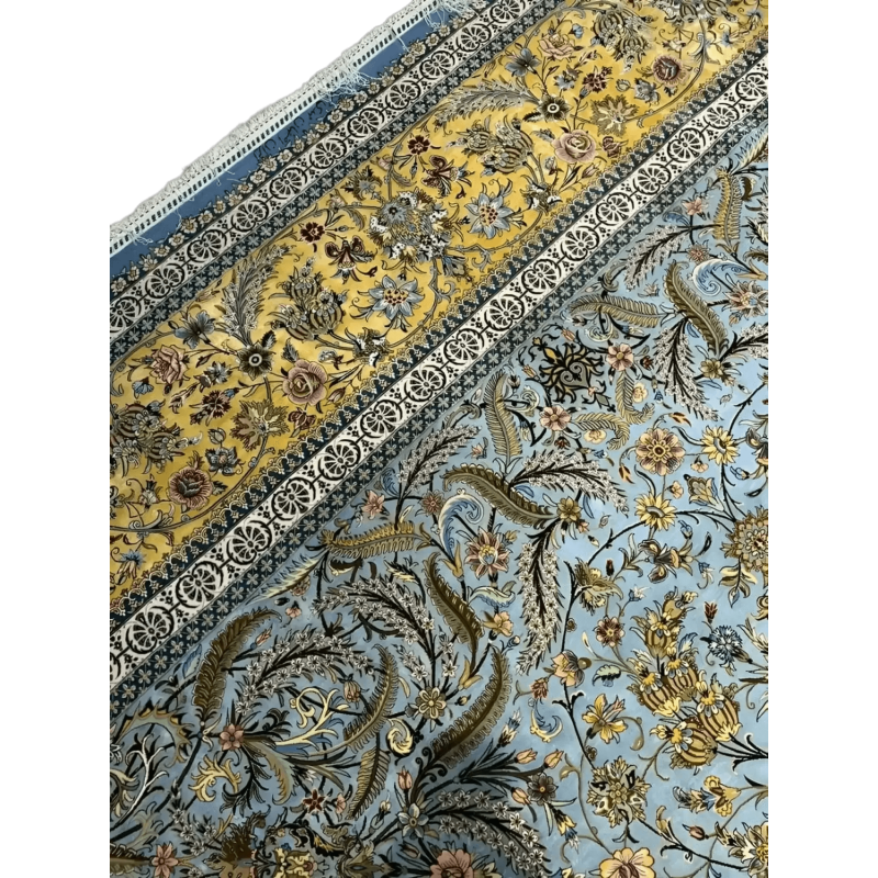 "Masterfully crafted Persian carpet in vibrant blue and gold tones, exemplifying the intricate weaving techniques of Isfahan, Iran."