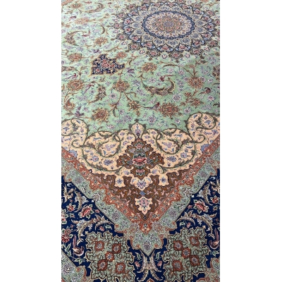 "Side view of hand-knotted Persian rug, made with silk warp and wool-silk blend."