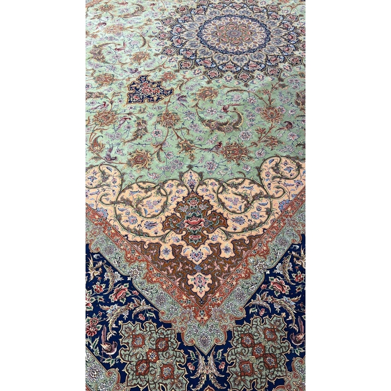 "Side view of hand-knotted Persian rug, made with silk warp and wool-silk blend."