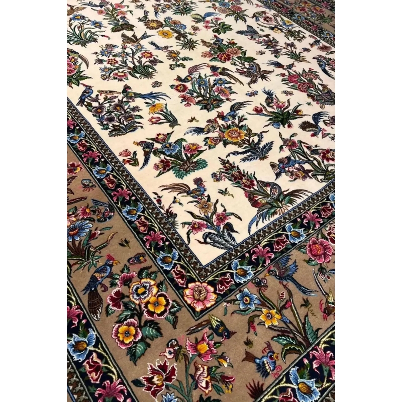 Mansourie's Legacy Persian carpet adorned with intricate floral and avian motifs
