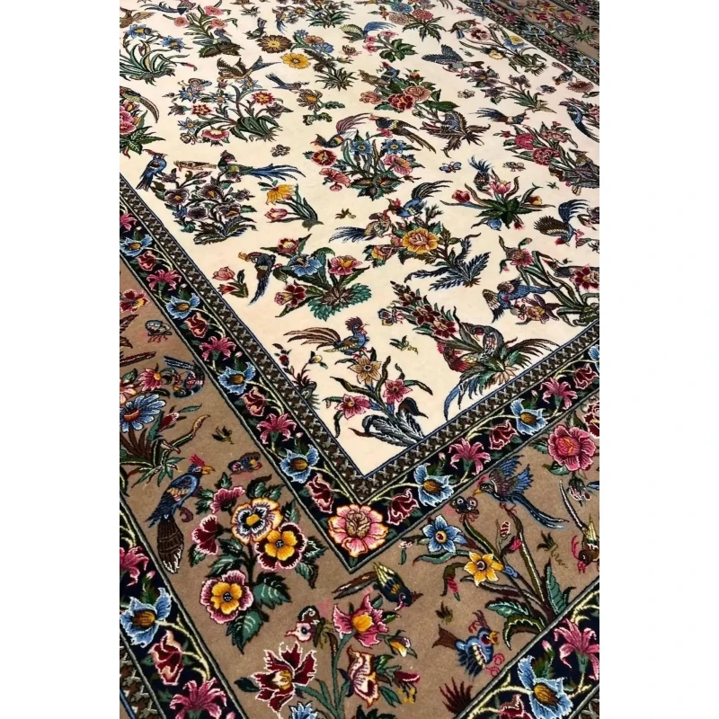 Mansourie's Legacy Persian carpet adorned with intricate floral and avian motifs