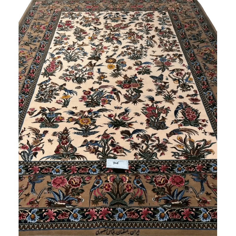 Close-up view of Mansourie's Legacy, showcasing the detailed floral patterns on the rare Persian carpet