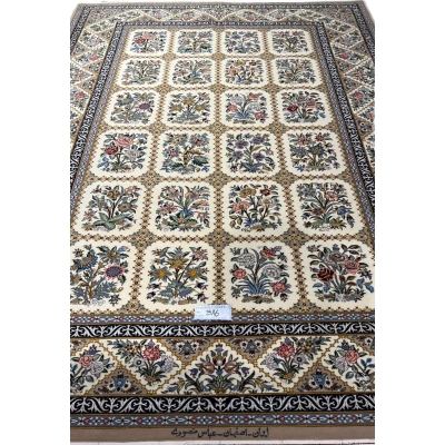 "Luxury hand-knotted Isfahan Persian rug with a floral grid design, crafted with 1,210,000 knots per square meter."