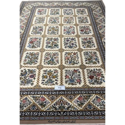 "Luxury hand-knotted Isfahan Persian rug with a floral grid design, crafted with 1,210,000 knots per square meter."