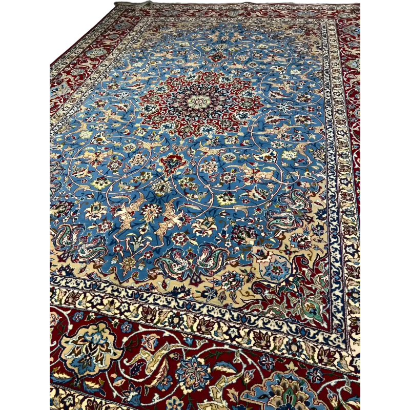 Close-up view of the intricate patterns on the Authentic Isfahan Rug with blue and red hues