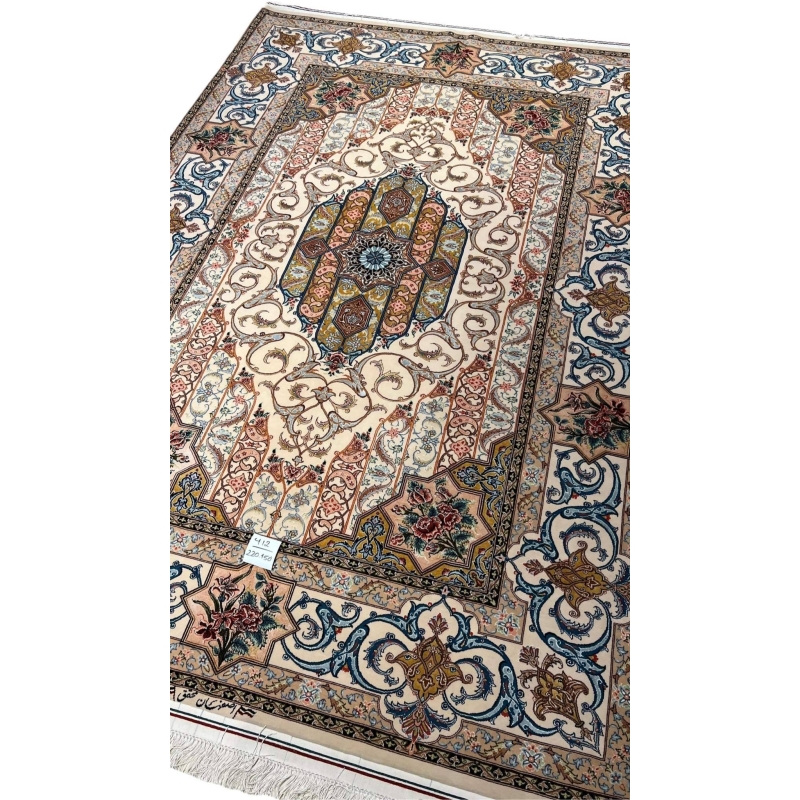 "Traditional handwoven Persian rug from Isfahan, showcasing an ornate floral medallion and elegant vine scrolls."