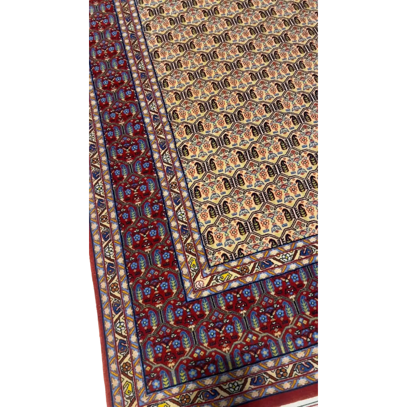 "Antique Persian rug with vegetable dyes and intricate patterns"